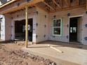 New construction home featuring an attached garage with covered patio and an entryway into the house at 3015 Dog Rose Drive Lot 170 Dr, Durham, NC 27703