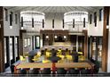 Stylish interior with modern lighting fixtures, bar seating, and tables for social gatherings at 3015 Dog Rose Drive Lot 170 Dr, Durham, NC 27703