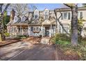 Charming townhouse with a well-manicured front yard and inviting entrance at 1303 Dylan Heath Ct, Raleigh, NC 27608