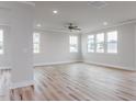 Bright, spacious living room boasting hardwood floors, neutral paint, and an abundance of natural light at 145 Bering Cir, Angier, NC 27501