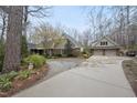 Charming home with a two-car garage and well-maintained landscaping at 3001 Hunters Bluff Dr, Raleigh, NC 27606