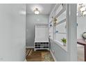 Hallway featuring built-in shelving at 4631 Timbermill Ct # 301, Raleigh, NC 27612