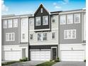 Modern townhome featuring a two-car garage and stylish dark and light gray exterior at 2009 Trident Maple Ln, Chapel Hill, NC 27517