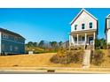 Attractive home exterior with a well-manicured lawn on a sunny day at 630 Great Ridge Pkwy, Chapel Hill, NC 27516