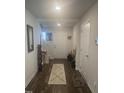Inviting foyer with hardwood floors, a decorative rug, and access to the staircase at 700 Cider Mill Way, Zebulon, NC 27597