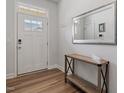 Bright foyer with wood floors and modern decor at 1123 Latitude Dr, Durham, NC 27713