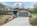 Well designed single Gathering home with driveway and well maintained landscaping at 610 Flemingtown Rd, Henderson, NC 27537