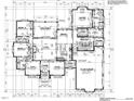 Detailed first floor plan with dimensions, including kitchen, living room, bedrooms, and garage at 63 Pennington Cir, Chapel Hill, NC 27517
