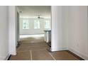 Living room with ample natural light showcases an open layout, ready for personalization at 283 Golfview Avenue, Benson, NC 27504