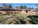 Open backyard offering plenty of room for recreation or gardening at 408 Rand Rd, Raleigh, NC 27603