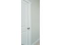 Detail of a clean, white bedroom door with modern hardware at 133 Ambergate Ct, Rocky Mount, NC 27804