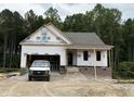 Image of a new home under construction with brick foundation and framed porch at 151 Tigris Ct, Zebulon, NC 27597