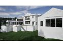 Beautiful modern home with a pool and outdoor entertaining area, set on a well-maintained lawn at 4900 Foxridge Dr, Raleigh, NC 27614