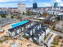 Modern townhomes in a cityscape offer sophisticated urban living with walkable city attractions and entertainment nearby at 512 Gordon St # 402, Durham, NC 27701