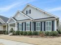 Charming single Gathering home with inviting front yard at 2013 Big Falls Dr, Wendell, NC 27591