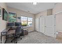 Cozy bedroom with neutral walls, plush carpet, and a large window overlooking the outdoors at 2914 Lake James Dr, Fuquay Varina, NC 27526
