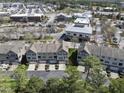 Aerial view shows the neighborhood's proximity to commercial areas with plenty of parking spaces at 3001 Valleystone Dr, Cary, NC 27519
