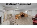 Unfinished walkout basement with new wood floors and room for customization and extra storage at 539 N Oneil St, Clayton, NC 27520