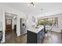 Bright kitchen featuring granite countertops, stainless steel appliances, and an eat-in breakfast nook with big windows at 5705 Dean Ave, Raleigh, NC 27616