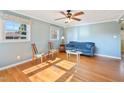 Bright living room features hardwood floors, fresh paint, and plenty of natural light at 1805 Lawrence Rd, Hillsborough, NC 27278