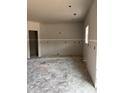 Unfinished room with drywall, concrete floors, recessed lighting, and electrical outlets installed at 228 Dove Rd, Cameron, NC 28326