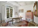 Bright office with hardwood floors, natural light, and vintage furnishings at 2613 Forest Lake Ct, Wake Forest, NC 27587