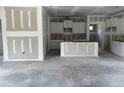 Spacious kitchen under construction with a central island and ample cabinet space at 4013 Kingcraig Ln, Zebulon, NC 27597