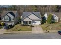 Attractive single story home nestled among mature trees in a well kept neighborhood at 626 Flaherty Ave, Wake Forest, NC 27587