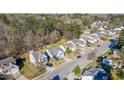 Birds eye view of a Gathering-friendly neighborhood with tree-lined streets and well-maintained homes at 626 Flaherty Ave, Wake Forest, NC 27587