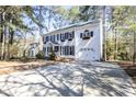 Charming two-story home with black shutters and a long driveway at 116 Lakeshore Dr, Durham, NC 27713