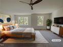 Spacious, virtually staged primary bedroom with large windows and natural light at 11700 Coppergate Dr # 105, Raleigh, NC 27614