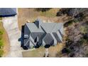 Overhead shot of the house highlighting its roof shape and surrounding landscape at 119 Cardinal Crest Ct, Pittsboro, NC 27312
