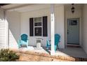 Inviting front porch featuring stylish seating and charming details, perfect for relaxing outdoors at 302 Weaver Ridge Rd, Rougemont, NC 27572