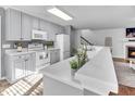 Well-equipped kitchen offering white appliances and a breakfast bar, great for everyday meals at 627 Nixon Dr, Sanford, NC 27330