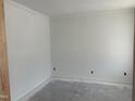 Unfinished bedroom featuring base trim, crown moulding, and electrical boxes at 9152 Dupree Meadow Dr # 12, Angier, NC 27501