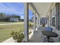 Inviting covered front porch perfect for enjoying the neighborhood views and quiet evenings at 236 Star Valley Dr, Angier, NC 27501