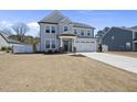 Beautiful home with a two-car garage, well-kept lawn, and a classic facade at 239 Hopper Cir, Clayton, NC 27520