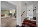 Warm and inviting foyer with tile floors and access to the living spaces at 315 Dumont Dr, Hillsborough, NC 27278