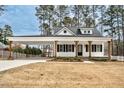 Home exterior showing covered parking and front lawn at 5450 Hunter Hill Rd, Rocky Mount, NC 27804