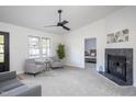 Inviting living room with a view into a bedroom and a cozy seating area at 602 N Mineral Springs Rd, Durham, NC 27703