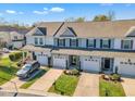 Birds eye view of beautiful townhomes in a neighborhood complete with lush green lawns at 946 Consortium Dr, Raleigh, NC 27603