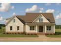 Charming home featuring a welcoming front porch, a mix of textures, and a well-manicured lawn at Lot 10H Good Shepherd Trl, Spring Hope, NC 27882