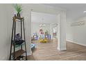 Welcoming entryway featuring a decorative storage rack and an open view to the home's interior at 118 Lockhaven Dr, Garner, NC 27529