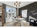 Modern office space featuring a sleek desk, stylish wallpaper, and ample natural light at 1255 Shaw View Alley # 201, Raleigh, NC 27601
