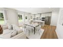 Bright living space with stainless steel appliances and a kitchen island at 296 Beacon Dr, Pittsboro, NC 27312