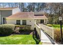 Inviting home with a well-maintained lawn and a quaint walkway leading to the front door, perfect for curb appeal at 5932 Whitebud Dr, Raleigh, NC 27609