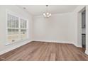 Dining room featuring hardwood floors, recessed lighting, and large window at 75 Eltham, Rocky Mount, NC 27804