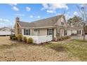 Charming single-story home featuring manicured landscaping and a white picket fence at 1159 Blue Bird Ln, Wake Forest, NC 27587