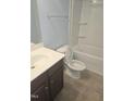 Bathroom with single sink vanity and tub/shower combo at 5016 Gailardia Dr, Zebulon, NC 27597