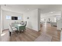 Bright, open office space with natural light and ample room for work, connecting seamlessly to the main living areas at 6529 Winter Spring Dr, Wake Forest, NC 27587